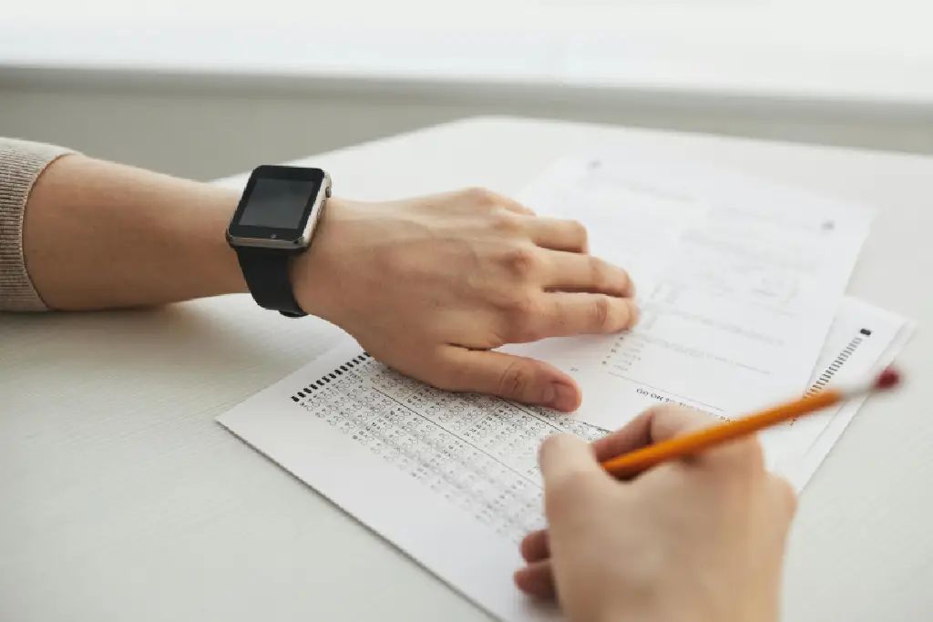 Person taking a test with pencil. Person taking a test with pencil.